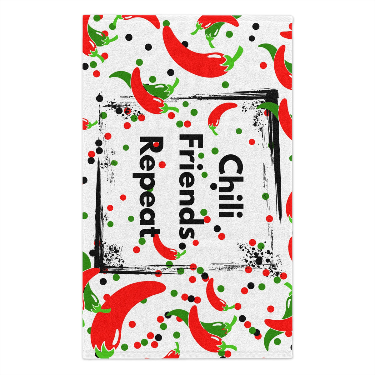 Vertical view of Chili Friends Repeat kitchen towel with red chili peppers and playful dots