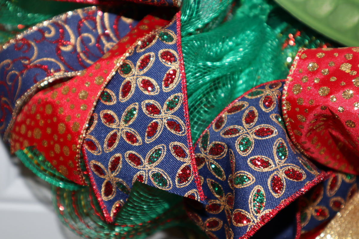 Navy red green and gold specialty ribbon detail on Christmas wreath