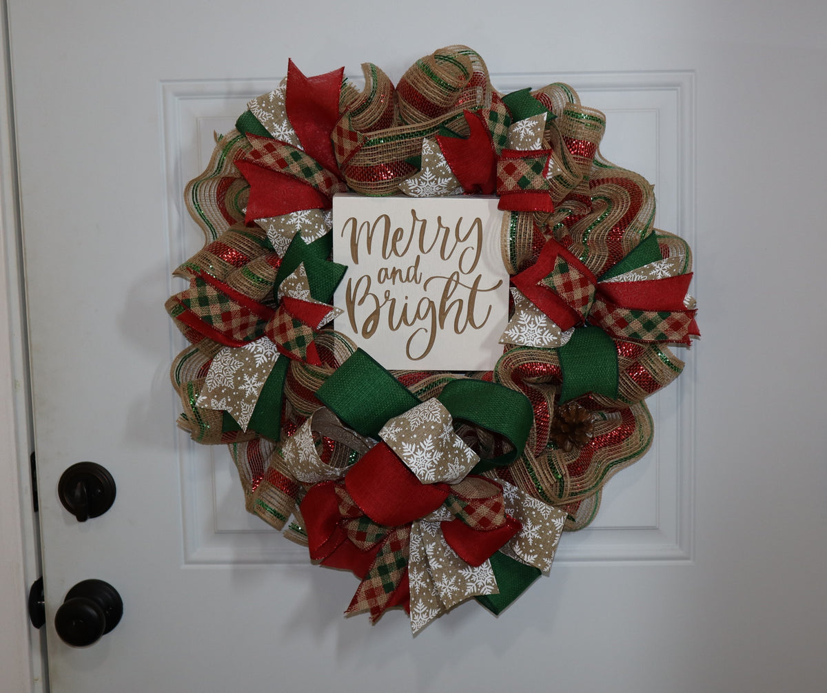 Merry and Bright Christmas wreath displayed on white front door