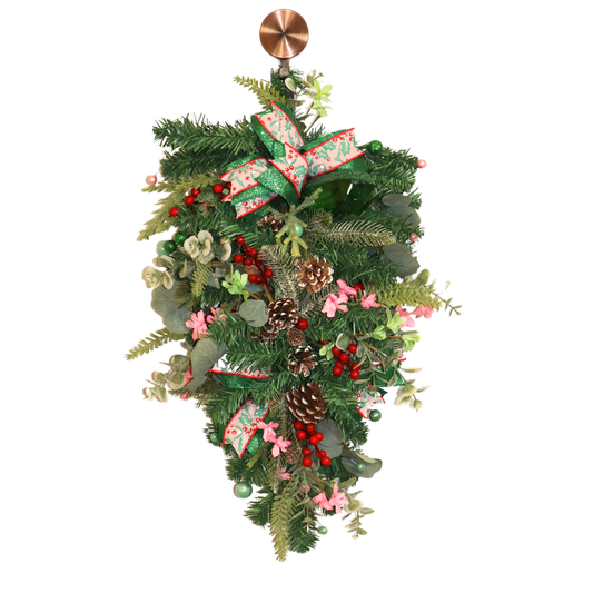 Emerald and pink woodland Christmas teardrop swag with greenery and pinecones