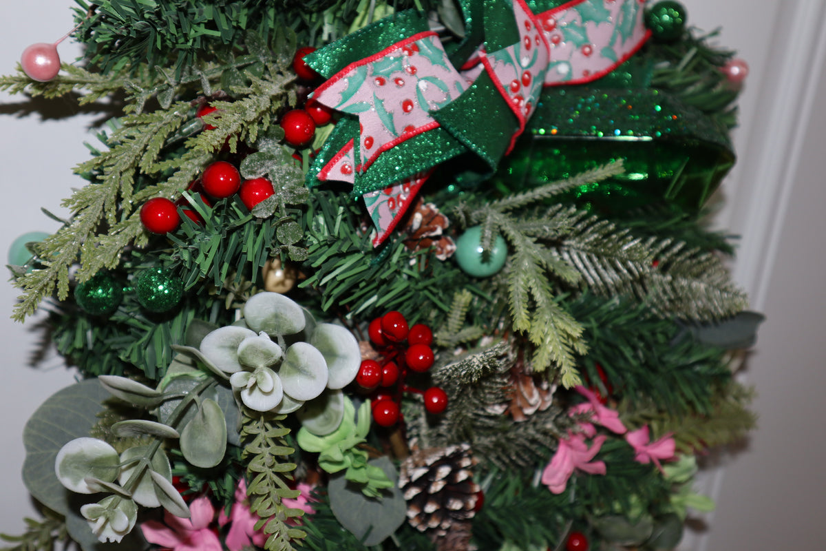Emerald gem berries ribbon and mixed greenery on handmade Christmas swag