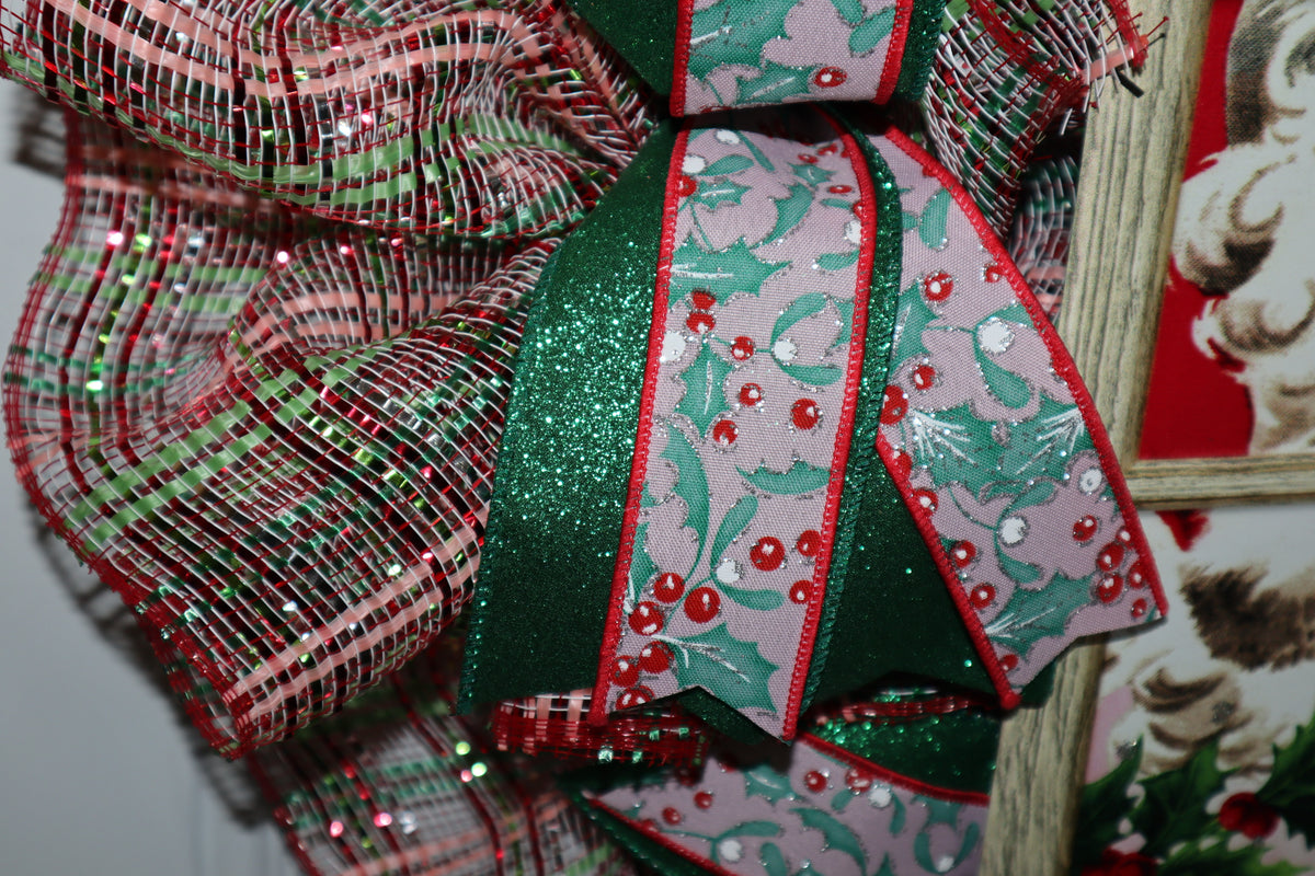 Red green and white deco mesh and Christmas ribbon detail