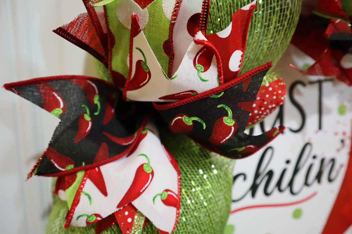 Red black white and green chili pepper wired ribbon detail