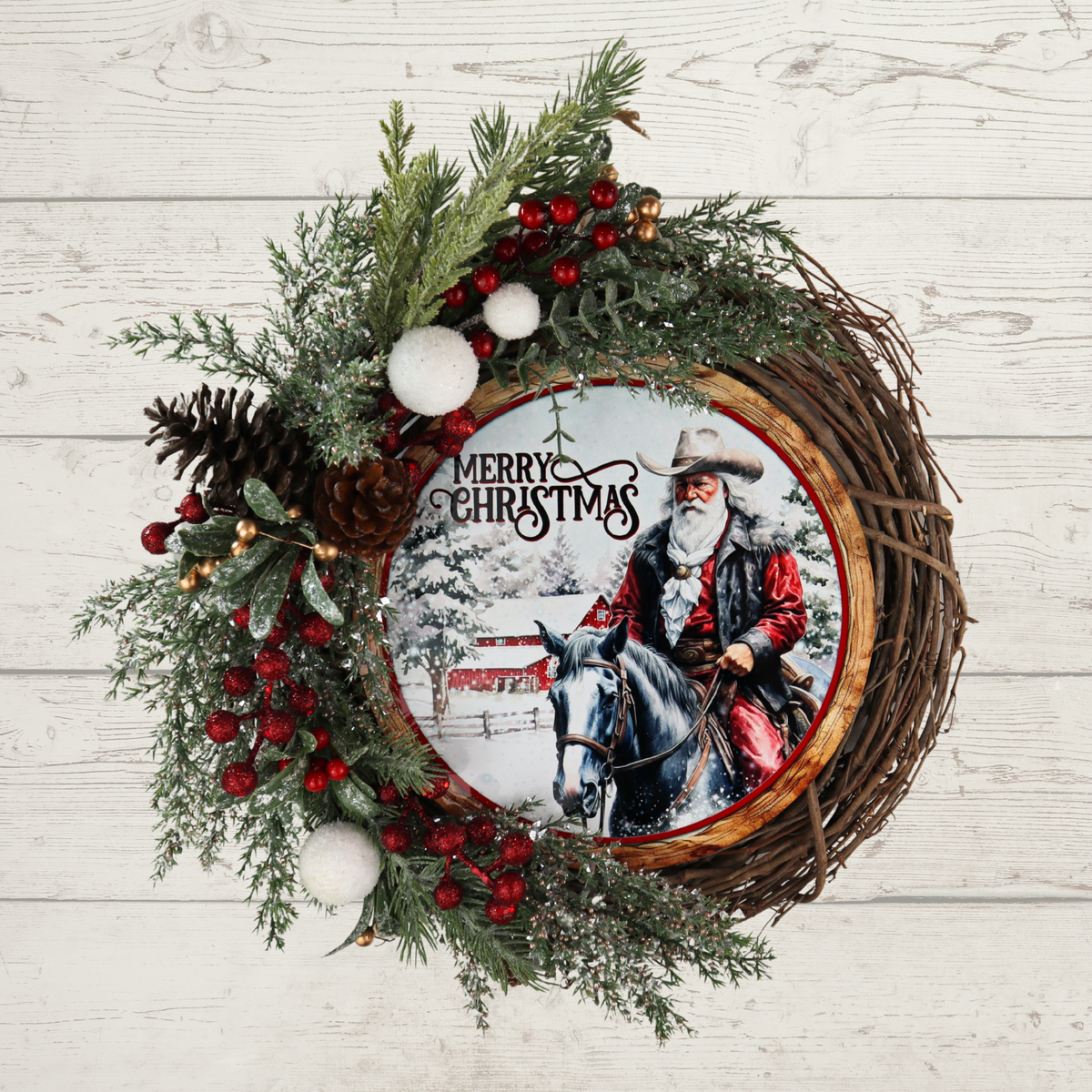 Western Christmas grapevine wreath with frosted greenery red berries and snowballs