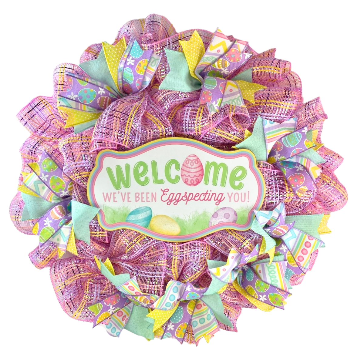 Welcome Easter pastel mesh wreath with wooden welcome sign, pink mesh, and colorful spring ribbons on a white background